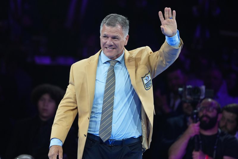 Aug 7, 2026; Canton, OH, USA; Adam Vinatieri reacts during the Pro Football Hall of Fame Gold Jacket dinner at Canton Memorial Civic Center and Cultural Center.
