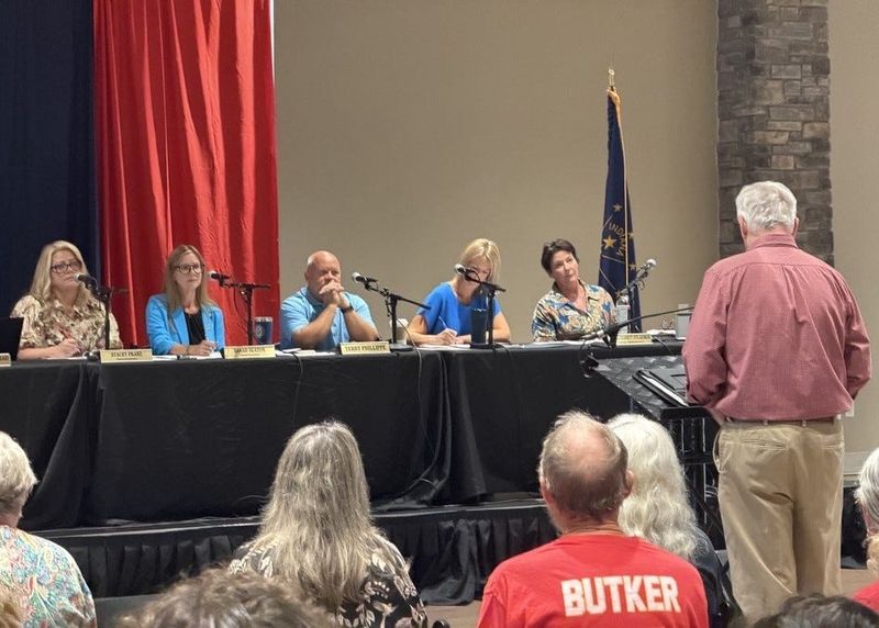 Members of the Warrick County Board of Commissioners listen to public comment during a special meeting on data centers Aug. 11, 2026, in Newburgh, Indiana.