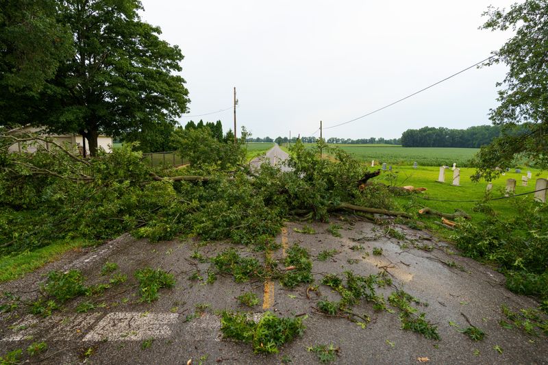 Debris blocks Ironwood Road near Roosevelt Road after a storm on Tuesday, Aug. 11, 2026, in South Bend.