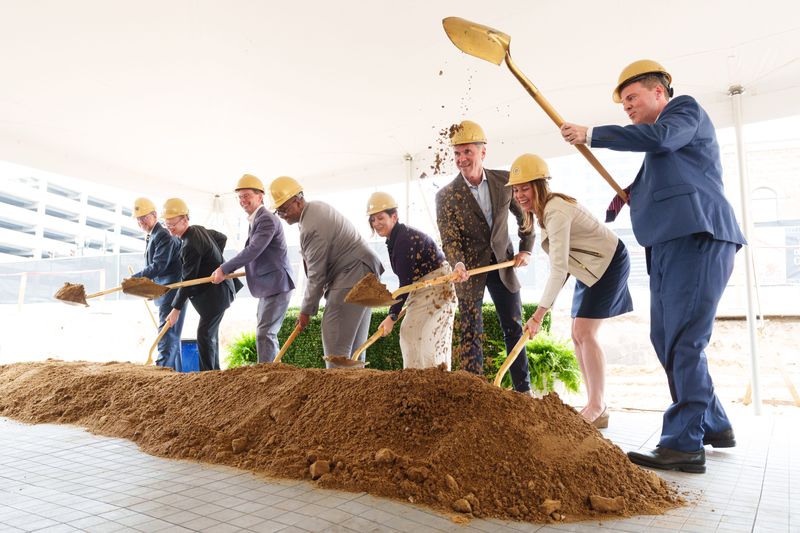Officials from the city, the University of Notre Dame and corporate partners break ground on Notre Dame's Colfax Corner project Thursday, Aug. 13, 2026, in South Bend.