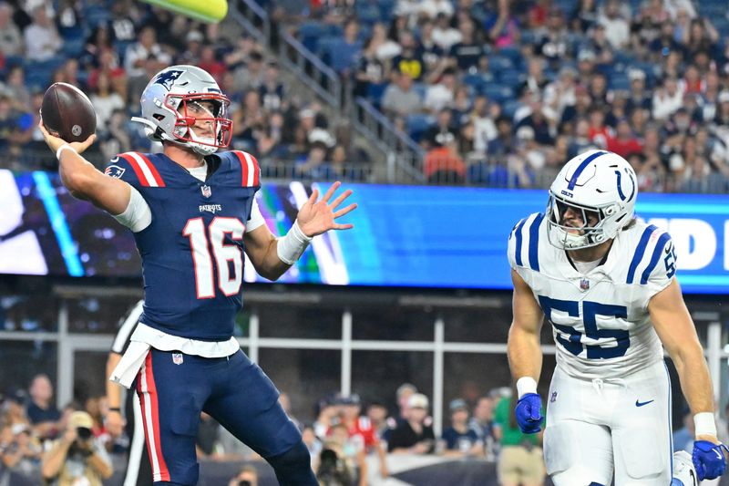Aug 13, 2026; Foxborough, Massachusetts, USA; New England Patriots quarterback Tommy DeVito (16) throws a pass against Indianapolis Colts defensive end Caden Curry (55) during the first half at Gillette Stadium. Mandatory Credit: Eric Canha-Imagn Images