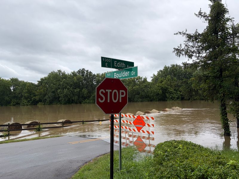 Flood water closed Edith Avenue in Noblesville on Aug. 14, 2026, near the road's intersection with Boulder Drive.