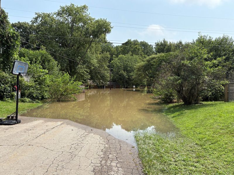 Manville Road, which runs between Memorial Drive and 15th Street on Muncie's southeast side, remained flooded on Thursday, Aug. 13.