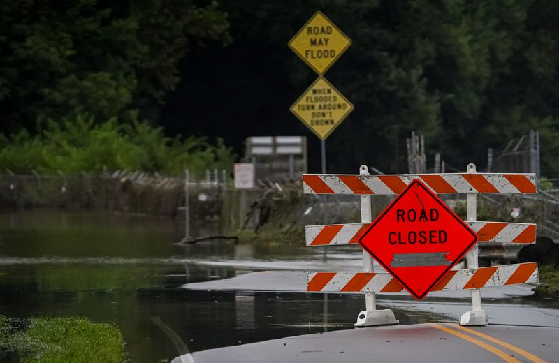 Floodwaters cover Riverwood Ave. on Sunday, Aug. 16, 2026, in Noblesville.