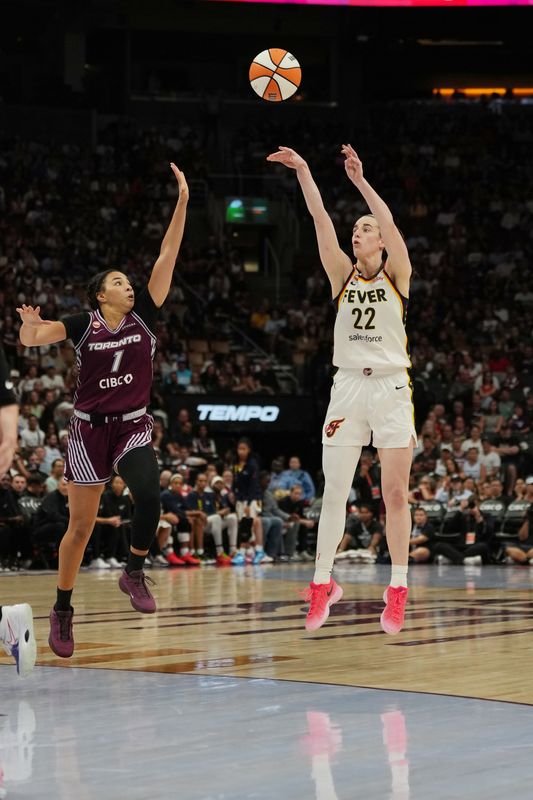 Aug 18, 2026; Toronto, Ontario, CAN; Indiana Fever guard Catlin Clark (23) shoots the ball over Toronto Tempo guard Kiki Rice (1) during the third quarter at Scotiabank Arena.