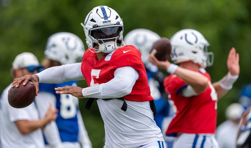 Indianapolis Colts quarterback Anthony Richardson Sr. (5) passes the ball Wednesday, Aug. 19, 2026, during a joint practice with the Atlanta Falcons at Grand Park in Westfield.