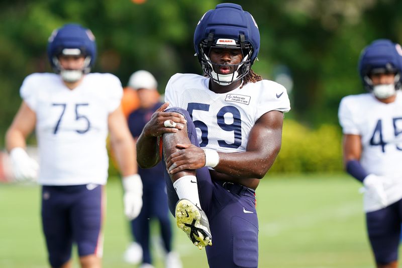 Chicago Bears defensive lineman Jamree Kromah (59) stretches during a joint training camp at the Kettering Health Practice Fields, Thursday, Aug. 20, 2026, in downtown Cincinnati.