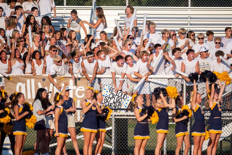 Castle fans cheer as they play the North Huskies at Bundrant Stadium in Evansville, Ind., Friday. August 21, 2026.