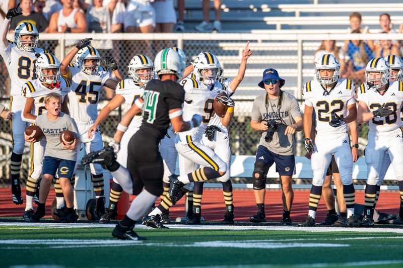 Castle's Jaivon Aunspach (9) runs the ball as the North Huskies play the Castle Knights at Bundrant Stadium in Evansville, Ind., Friday. August 21, 2026.