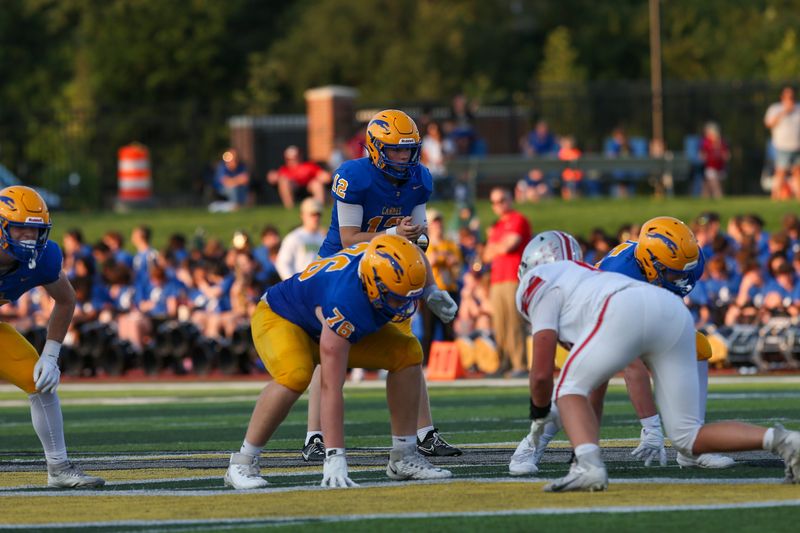 Carmel Jackson Treadway (12) waits for the snap of the ball as the Carmel Greyhounds took on the Fishers Tigers in IHSAA football, Aug 21, 2026; Carmel, IN; at Carmel High School.