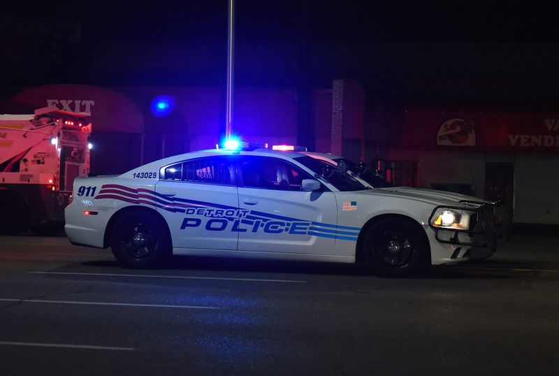 Two Detroit police cars sit side by side on East Jefferson Avenue near Mt. Elliott and Immigration and Border Patrol offices in Detroit on June 11, 2017. Reportedly a protest had been occuring in the area.
(Robin Buckson / The Detroit News)