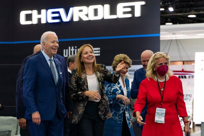 President Joe Biden is given a tour by General Motors CEO Mary Barra flanked by local officials at the 2022 North American International Auto Show held at Huntington Place in downtown Detroit on Wed., Sept. 14, 2022
