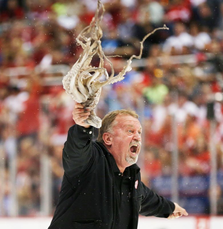 Zamboni driver Al Sobotka with a thrown octopus in the third period of the Detroit Red Wings' 3-1 win over the Chicago Blackhawks during Game 3 of their NHL playoff series at Joe Louis Arena in Detroit on May 20, 2013.