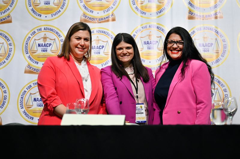 From left, Rep. Elissa Slotkin, Rep. Haley Stevens, and Rep. Rashida Tlaib pose for a photo before the start of the NAACP 68th Annual Fight For Freedom Fund Dinner, Sunday, June 25, 2023, at Huntington Place in Detroit. Slotkin and Stevens are teaming up on a new effort to ban Chinese vehicles from entering the United States.
