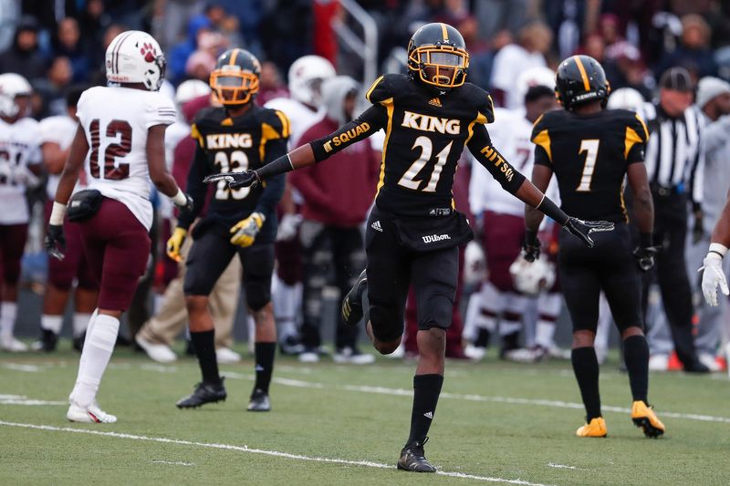 Detroit King defensive back Ahmad Gardner (21) celebrates a tackle against River Rouge during the first half at King High School in Detroit, Friday, Oct. 26, 2018.