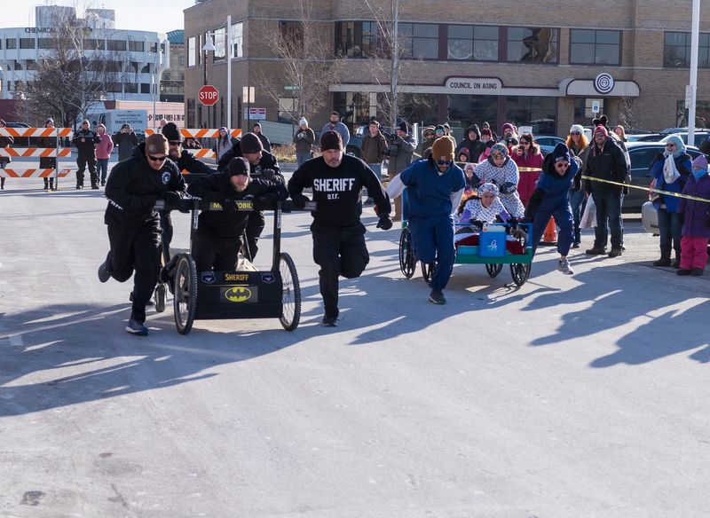 The St. Clair County Sheriff Department takes on the Orthopedic Associates team Saturday, Jan. 26, 2019 during the annual Port Huron Chilly Fest bed races.