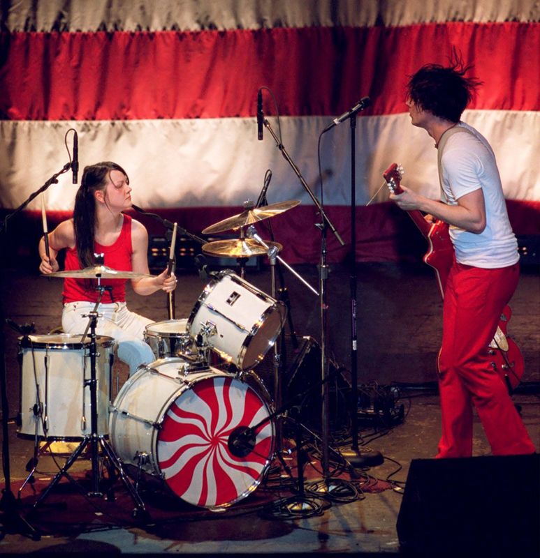 Meg White, left, and Jack White of the White Stripes perform in May 2002 at the Royal Oak Theater in Royal Oak.