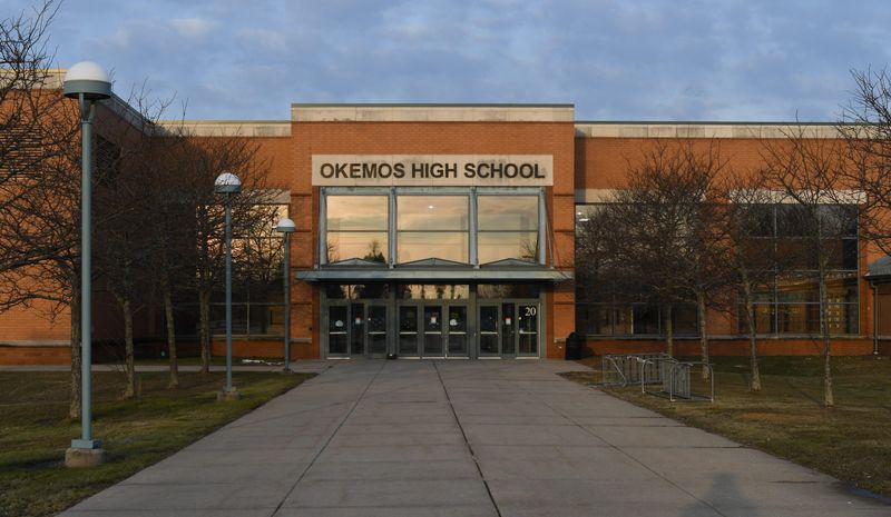 The main entrance of Okemos High School in Meridian Township, pictured Monday, March 8, 2021.