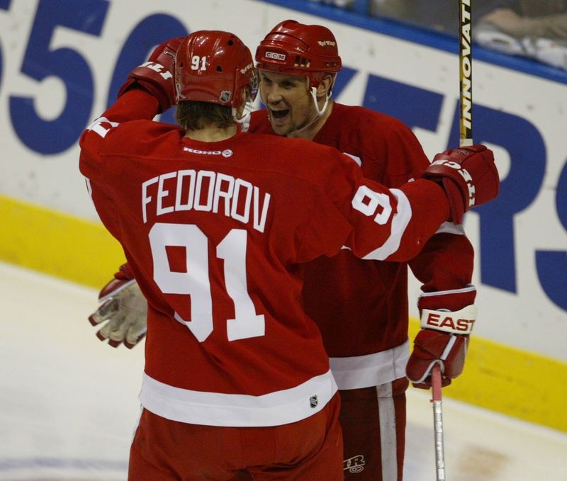 Detroit Red Wings' Steve Yzerman celebrates his goal with Sergei Fedorov vs. the St. Louis Blues in the third period at the Savvis Center in St. Louis in Game 4 of the Western Conference semifinals May 9, 2002.