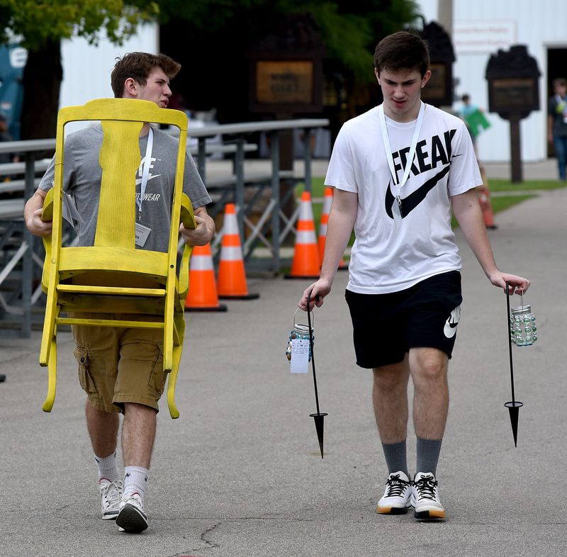 Alex Anderson, then 17, (left) and his brother, Nick Anderson, then, 15, of Petersburg bring their 4-H projects to the Monroe County Fair in a previous year. The brothers were part of Ottawa Lake Servers 4-H.