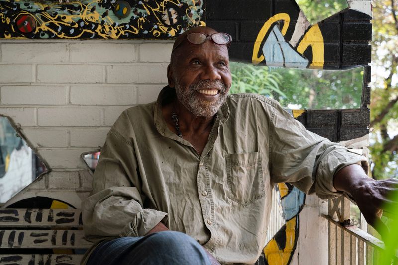 Museum owner Olayami Dabls, 74, smiles for a photograph outside of the MBAD African Bead Museum in Detroit on Wednesday, July 12, 2023. "The goal was to have a bead museum where African children could come and see things related to their ancestors," said Dabls, who opened the museum in 1999. "But no children came out wanting to see this. It was just adults from all over the world. It was not designed as a tourist attraction, but there are certain things that are universal to our planet and to our people."