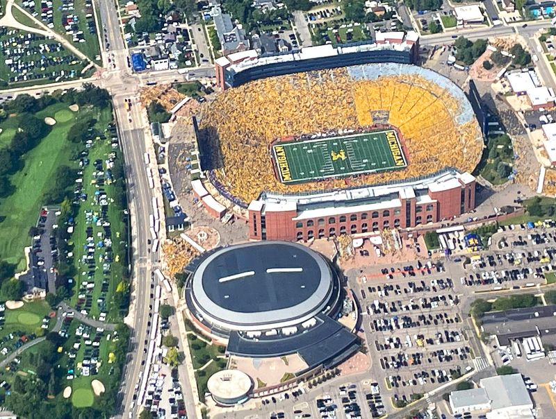 The Big House, home to the University of Michigan football team, had a maize out during the first home game of the 2023 season vs. East Carolina on Sept. 2, 2023. Photo was taken from a helicopter as the band played on the field shortly before kickoff.