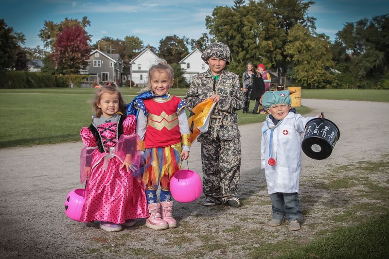 Allie and Gia Canon and Luke and Tristan Leito trick-or-treat in 2019.