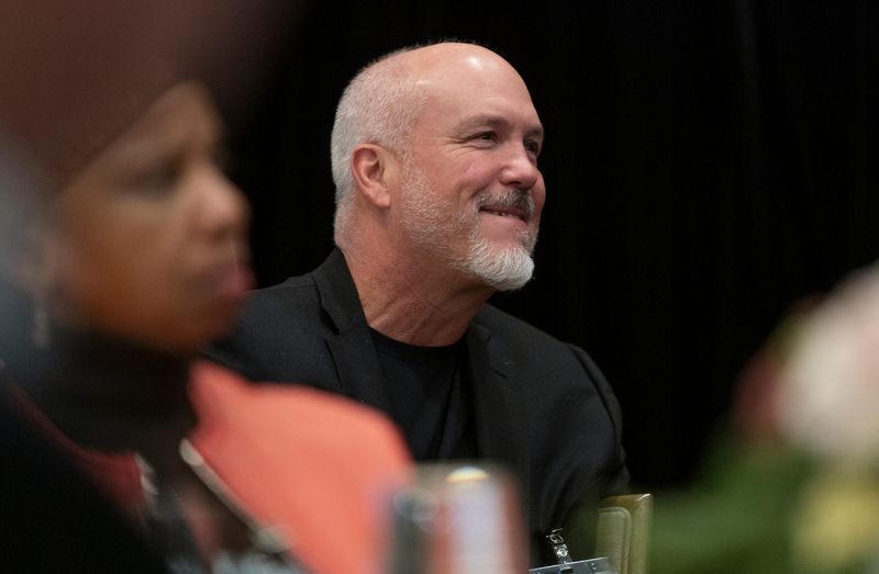 President and Chief Operating Officer of Rocket Companies Bill Emerson smiles as The Detroit Free Press Breakfast Club host Carol Cain interviews Dan Gilbert, the President and Chairman of Rocket Companies and philanthropist at the Townsend Hotel in Birmingham on Thursday, Nov. 30, 2023.