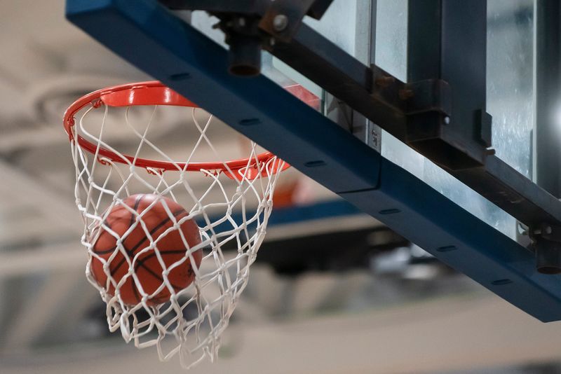 The Howell and Salem girls varsity basketball teams warm up for their game on Friday, Jan. 19, 2024 at Salem High School in Canton.