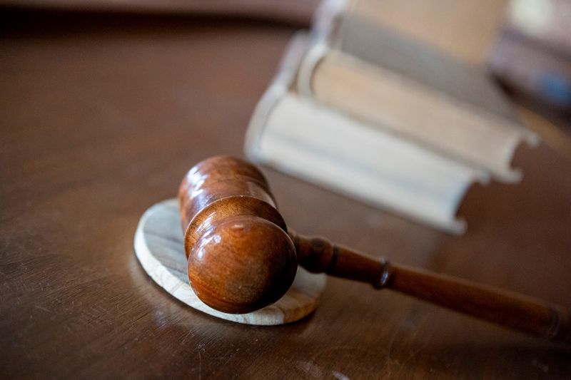A gavel and law books inside the 1885 Eaton County Courthouse, also known as Eaton County's Museum at Courthouse Square, in Charlotte, March 29, 2022.