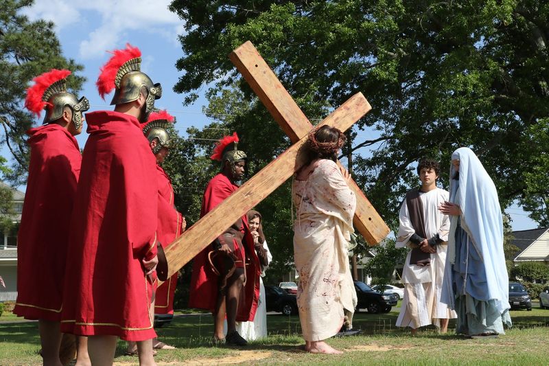 A life-like recreation of the Stations of the Cross took place at Forsythe Park on Good Friday, April 15, 2022.   The presentation included costumed Roman Soldiers, as well as men and women in period attire.  They reenacted the events that took place on the first “Good Friday” over 2,000 years ago. The event was sponsored by the Knights of Columbus Council #1337.