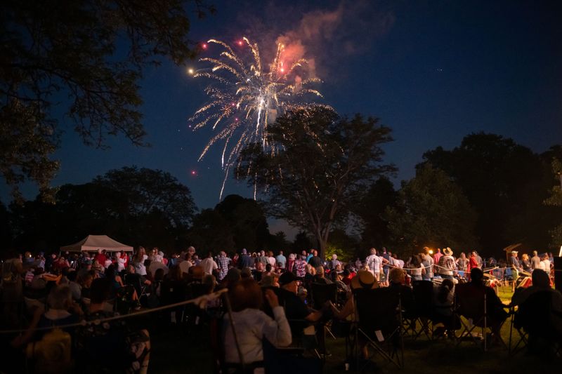 Fireworks explode during the annual Salute to America event at Greenfield Village, in Dearborn, July 3, 2023.
