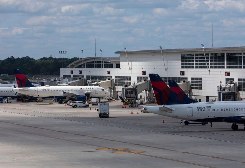 A Delta airplane fleet is parked at the McNamara Terminal in Detroit Metro Airport on Friday morning, July 19, 2024.