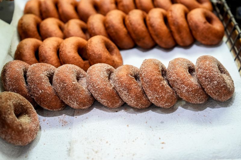 Regular and cinnamon sugar doughnuts at Dexter Cider Mill in Dexter on Thursday, September 5, 2024.