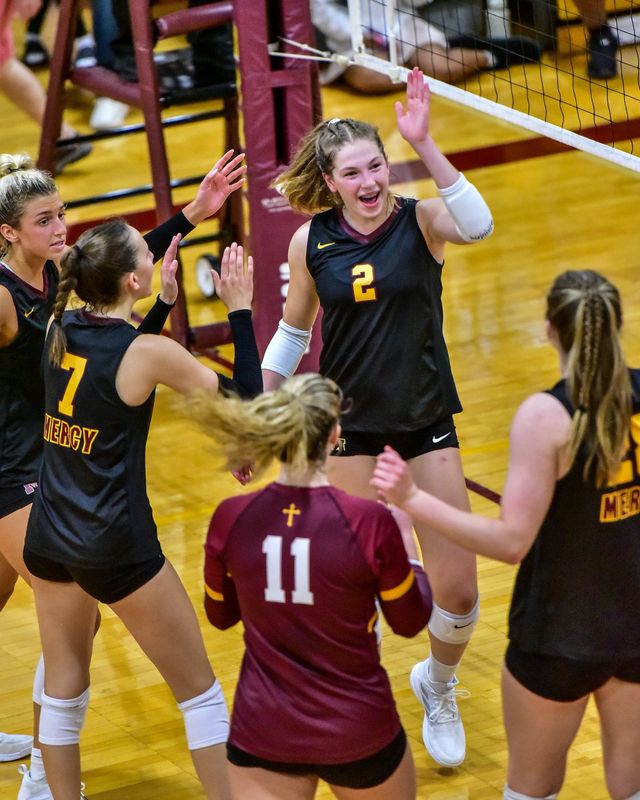 Farmington Hills Mercy's Kate Kalczynski celebrates a kill during a Catholic League volleyball match on Wednesday, Sept. 18, 2024.