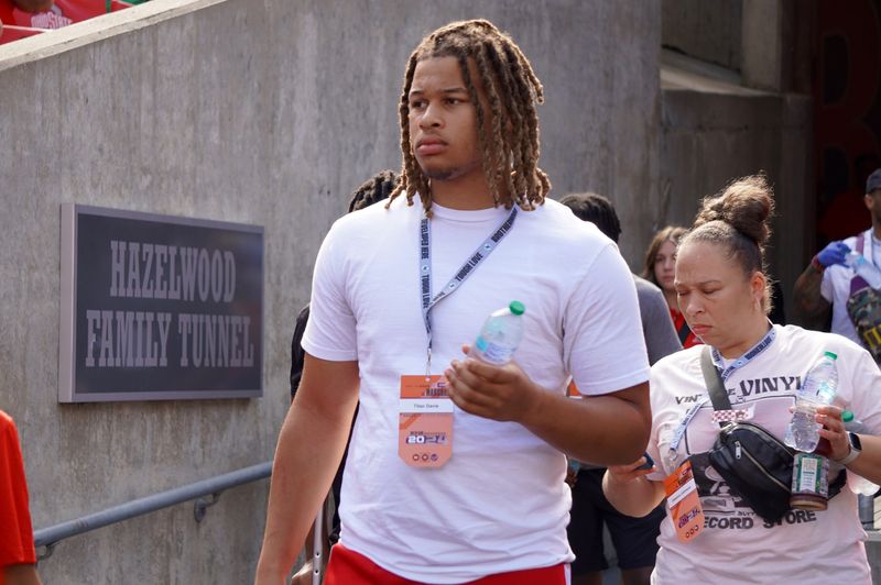 Sept. 21, 2024; Columbus, Ohio, USA; DeSmet (Missouri) defensive lineman Titan Davis watches warm-ups before Ohio State's game against the Marshall University Thundering Herd at Ohio Stadium.