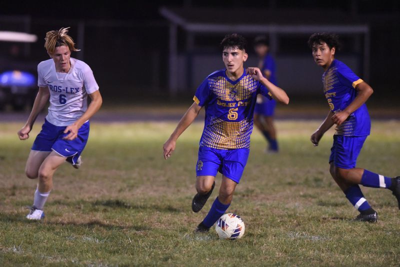 Imlay City's Benino Barragan dribbles the ball during a game last season.