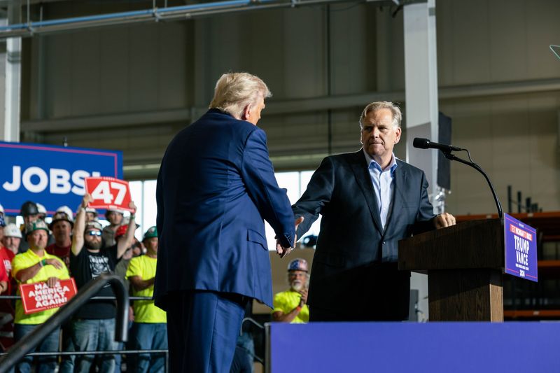 Former Congressman Mike Rogers speaks at the Donald Trump rally on Friday, Sept. 27 at the FALK Production.