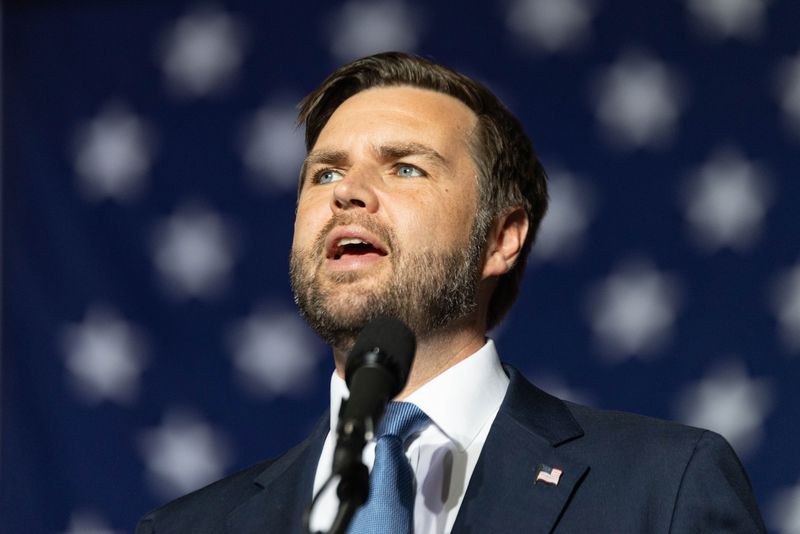 VP nominee JD Vance speaks during a rally at HES Equipment on Tuesday, Oct. 29, 2024, in Holland.