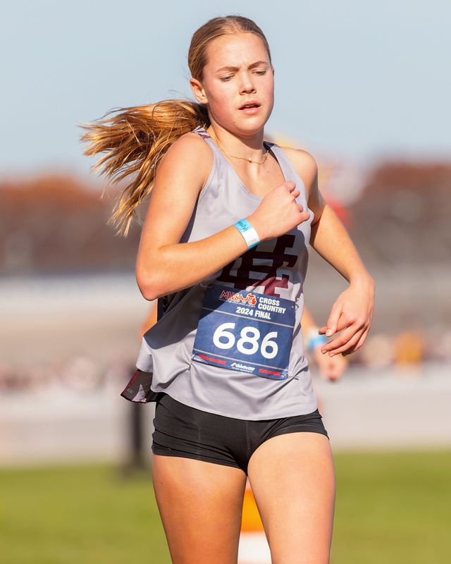 Holland Christian's Annika Stob runs in the Division 2 MHSAA cross country finals Saturday, Nov. 2, 2024.