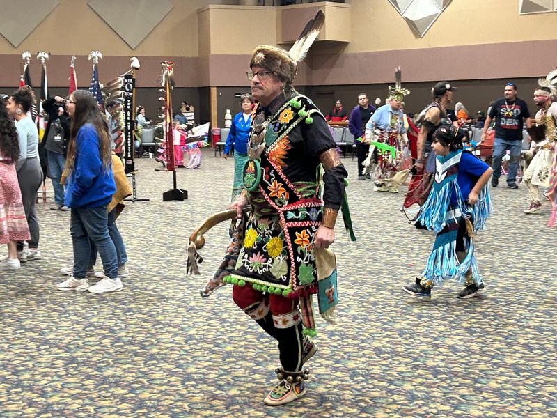 Dancers in traditional dress take part in the Sault Tribe of Chippewa Indians' annual Veterans Powwow at the Kewadin Casinos DreamMakers Theater on Saturday, Nov. 9, 2024.