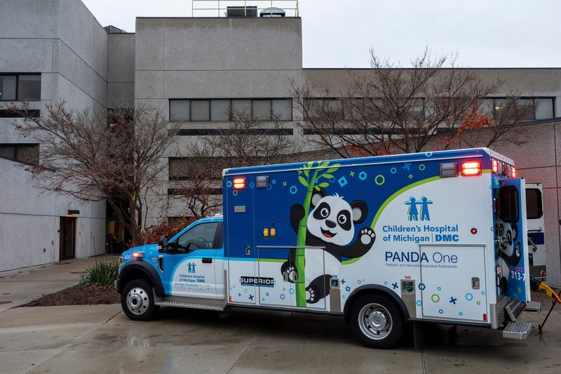 The Panda One ambulance for the Corewell Health Children's and Children's Hospital of Michigan is parked outside the Corewell Health Taylor Hospital during a press conference in Taylor on Wednesday, Nov. 20, 2024.