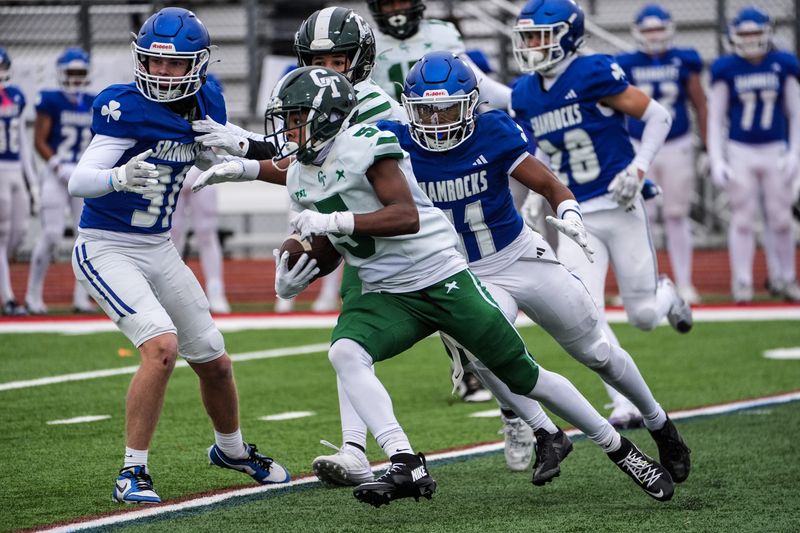 Cass Tech WR Will Sykes (5) runs for yards against Novi Detroit Catholic Central during MHSAA semifinals at Troy Athens high school on Saturday, Nov. 23, 2024. Cass Tech won 17-14.