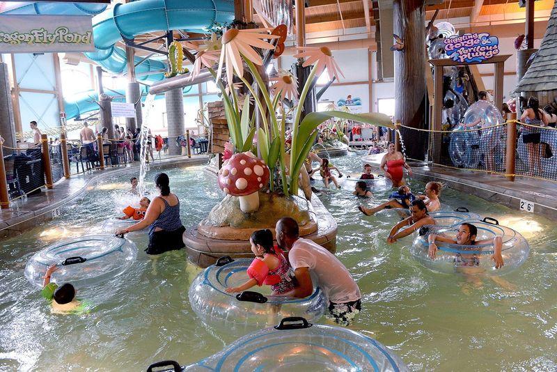 Patrons at Zehnder's Splash Village waterpark coast through the lazy river in 2019. The Frankenmuth hotel offers two waterpark areas.