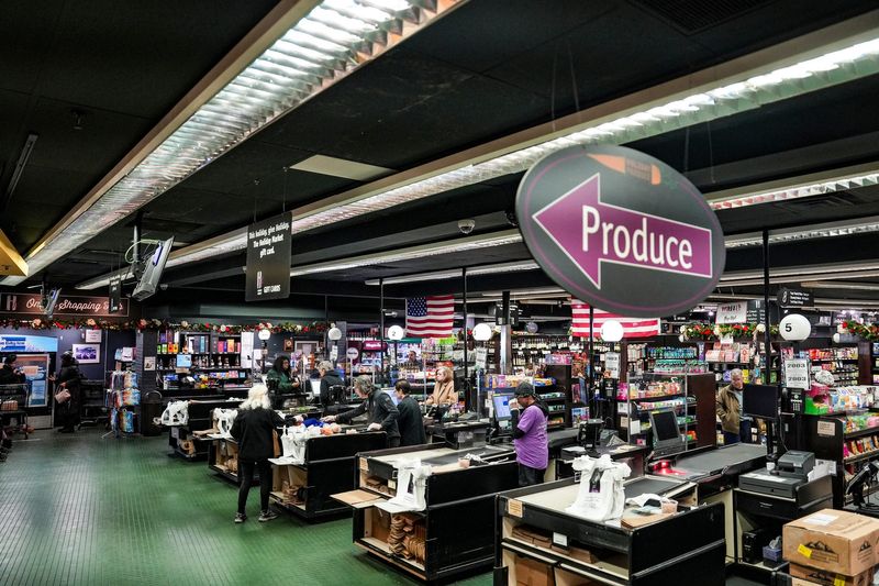 The checkout line at Holiday Market in Royal Oak on Tuesday, Dec. 3, 2024.