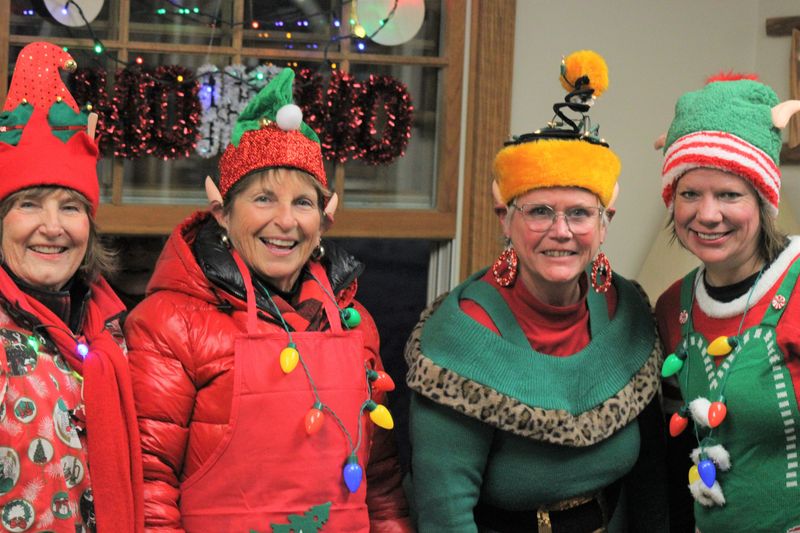 People enjoy the annual Parade of Lights in downtown Cheboygan on Saturday, Dec. 7, 2024.
