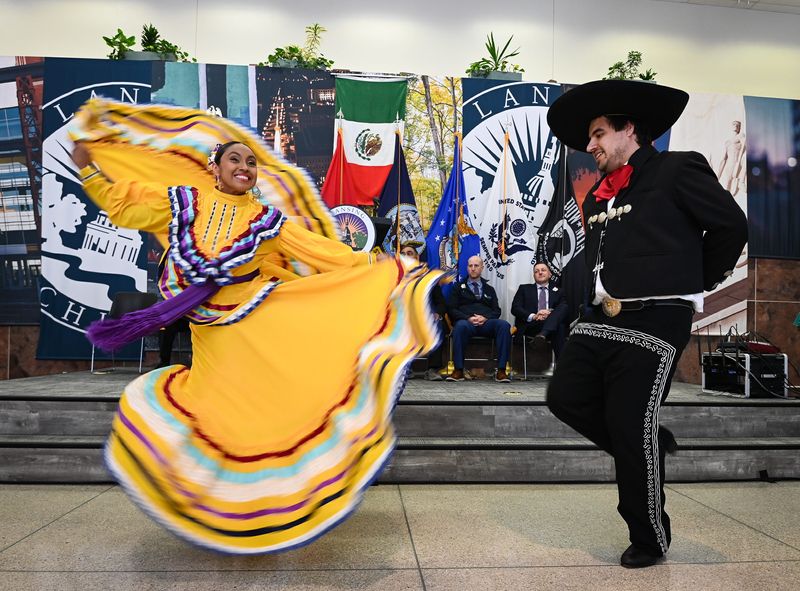 Lena Garcia and Jonah Brown of Ballet Maria Luz perform Monday, Sept. 16, 2024, during the Lansing Celebrates Hispanic Heritage Month celebration at Lansing City Hall.