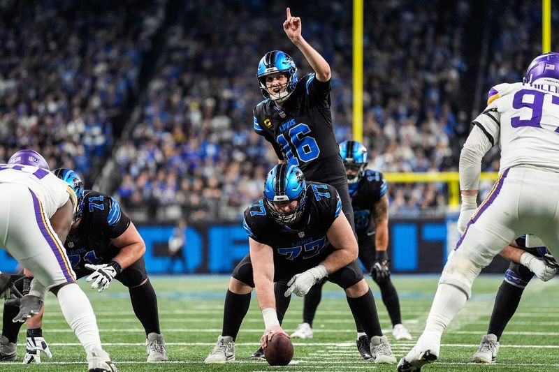 Detroit Lions quarterback Jared Goff (16), center, signals teammates before a play against Minnesota Vikings during the second half at Ford Field in Detroit on Sunday, Jan. 5, 2025.