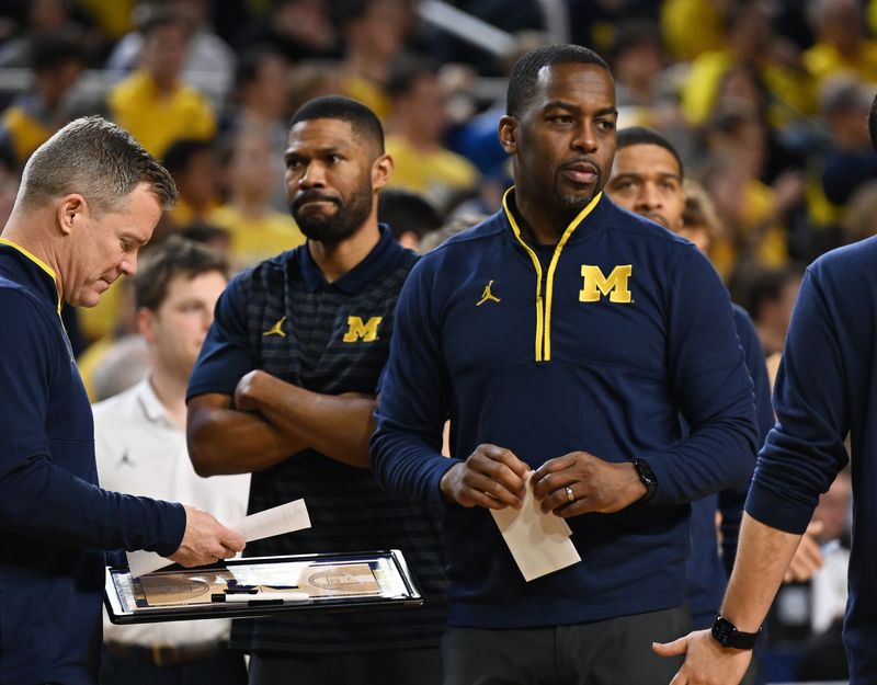 According to Michigan basketball coach Mike Boynton Jr.'s employment agreement, only the first year of his two-year contract is guaranteed.
