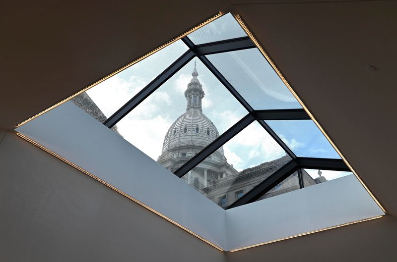 The Michigan Capitol dome is seen through a skylight in the north lobby, one of four skylights in the Heritage Center, Wednesday morning, June 29, 2022.